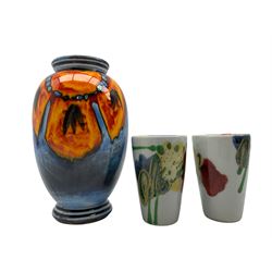 Poole pottery poppy pattern vase of ovoid form and two small Dartington vases designed by Janice Tchalenko stamped beneath max H22cm (3)