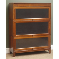 Mid 20th century mahogany three sectional stacking bookcase, three glazed up and over hinged doors, square tapering supports, W87cm, H113cm, D32cm