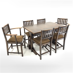 ercol oak draw leaf dining table on shaped end supports connected by stretcher (H73cm, 71cm x 114cm - 174cm), and set six (4+2) dining chairs 