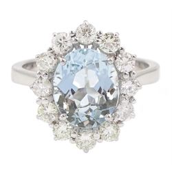 18ct white gold oval aquamarine and round brilliant cut diamond cluster ring, hallmarked, aquamarine approx 2.10 carat, total diamond weight approx 0.75 carat