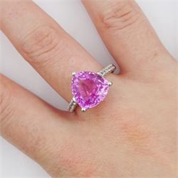 18ct white gold single stone trillion cut pink sapphire ring, with round brilliant cut diamond shoulders, sapphire approx 5.30 carat, total diamond weight 0.20 carat, hallmarked