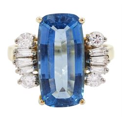 14ct gold blue topaz and diamond ring, the octagonal cut blue topaz, with five tapered baguette cut and round brilliant cut diamonds set either side, London import mark 1993