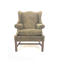  George III style wingback chair upholstered in green patterned fabric, with squab cushion, raised on moulded supports, W80cm  