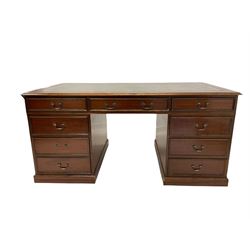 Mahogany twin pedestal desk, moulded rectangular top with leather inset, fitted with seven drawers