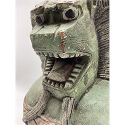 Large Chinese carved Lion Dog or Guardian Lion, the open mouthed lion with front foot resting on a ball, with polychrome decoration, H42cm x D26cm 