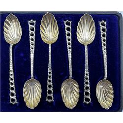 Set of six silver coffee spoons with gilded shell shape bowls and open twist stems Chester 1898 Maker Stokes and Ireland, cased and set of six seal top coffee spoons Birmingham 1923 4oz