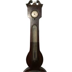 Wiggington of Pickering - 19th-century mercury wheel barometer in a mahogany case with a hygrometer, bubble level and boxed spirit thermometer, 8-inch register recording barometric air pressure in inches, case with a swans neck pediment and round base. 