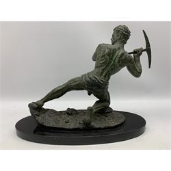 French Art Deco sculpture of miner with pick axe upon naturalistic base mounted on onyx plinth W54cm