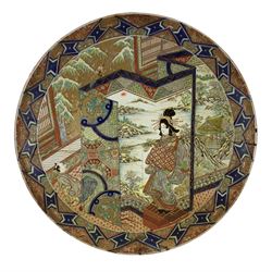 Large Japanese Meiji Imari charger, painted and gilded with two figures in a landscape, D61cm 