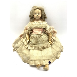 19th century wax and composite doll, wax head and limbs, inset sleeping glass eyes and blond ringlet hair, L58cm 