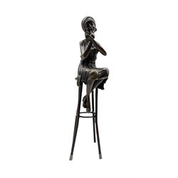 Art Deco style bronze figure of a lady with compact in hand, seated on a stool, with foundry mark, H27cm