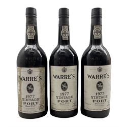 Three bottles of Warre's vintage port 1977, 75cl, with receipt from Adnams, Suffolk 1983