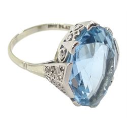 Art Deco white gold and platinum single stone aquamarine ring, with diamond set shoulders, the aquamarine approx 21mm x 16mm x 8mm, circa 1930's, stamped 18ct Plat
