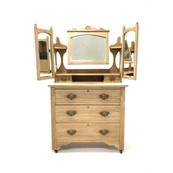 Edwardian satin walnut dressing chest, the top section fitted with three swing mirrors and two trinket drawers, three drawers to base, raised on castors, W126cm, H158cm, D46cm