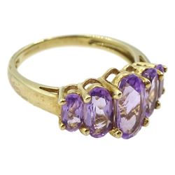 9ct gold five stone graduating oval amethyst ring, hallmarked 