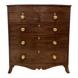 Late 19th century mahogany bow-front chest, figured frieze over two short and three long drawers with brass handles and bone escutcheons, shaped apron and splayed bracket feet 