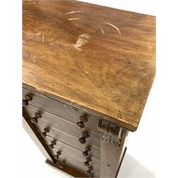 Mahogany pedestal chest, the rectangular top over two leaf carved corbels and seven graduated drawers, raised on plinth base W49cm, H105cm, D35cm