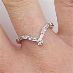 White gold single stone diamond wishbone ring, with channel set diamond shoulders
