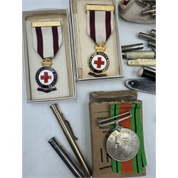 Early 20th century compass in japanned brass case, pat no. 12777, 1906, Ronson lighter, hallmarked silver folding knife, mother of pearl and silver fruit knife, Red Cross medals, silver & rolled gold propelling pencils, The Defence Medal named to Mrs Ina Harris, silver plated hip flask, James Healey & Sons A1 double-lever corkscrew etc 
