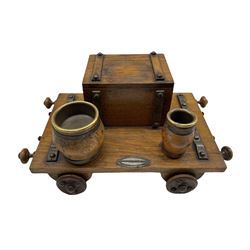 Early 20th century oak smokers stand in the form of a railway wagon with covered box etc W30cm