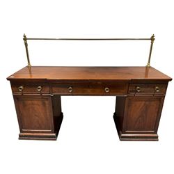 George III mahogany break-front sideboard, the figured top with raised brass rail and inlaid satinwood band over three drawers, on twin pedestal base each fitted with cupboard, raised on moulded plinth base