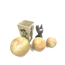 Three graduated terracotta balls (D35cm) together with a glazed ceramic planter of tapering form (H47cm) and a model of a cockerel (H45cm)