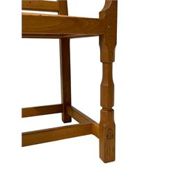 Knightman - set six oak dining chairs, open and pierced back carved with Yorkshire rose, tan leather upholstered seat with studwork, on octagonal front supports joined by plain stretchers, four side chairs and two carvers, by Horace Knight of Balk, Thirsk