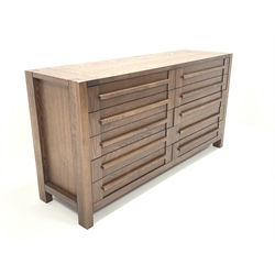 Contemporary walnut sideboard, fitted with two banks of five drawers, raised on block supports, W170cm, H88cm, D50cm