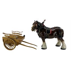 Pottery horse and dray cart and another horse and cart