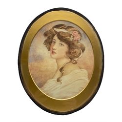English School Early 20th century): Portrait of a Young Woman, oval watercolour indistinctly signed and dated '04, 26cm x 21cm