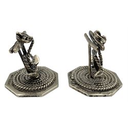 Pair of Edwardian novelty silver menu/ place card holders, each modelled as anchors with twisted rope detail that wraps around the octagonal base, hallmarked J W Barrett & Sons Ltd, Birmingham 1906 and retaild by Page, Keen & Page, H3.5cm 