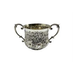 Victorian silver two handled porringer with embossed floral decoration and scroll handles, the cartouche inscribed 'Gladys 1895' H8cm London 1893 Maker Ackroyd Rhodes, Manoah Rhodes Ltd 7oz