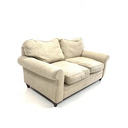 Contemporary two seat sofa, with loose cushions, upholstered in natural linen, raised on turned front supports W174cm