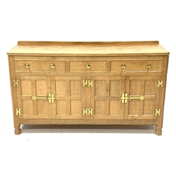 'Eagleman' adzed oak dresser, three drawers above two double cupboards enclosed by four panelled doors, brass fittings, by former 'Mouseman' apprentice Albert Jeffray of Sessay, Thirsk, W148cm, H86cm, D47cm