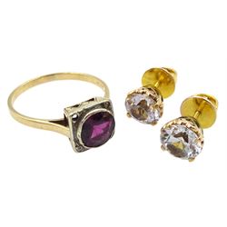 Pair of gold clear stone set stud earrings and a gold purple stone and diamond ring