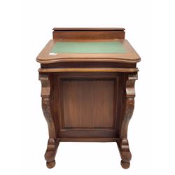 Victorian style mahogany davenport, the top with lift up storage compartment over sloped fall writing surface inset with green skiver and drawers inside, the sides fitted with eight drawers, raised on bun supports W54cm