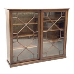 Edwardian mahogany Georgian style library bookcase enclosed by two astragal glazed sliding doors, six adjustable shelves to interior, W145cm, H122cm, D35cm