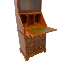 Georgian design yew wood bureau bookcase, arched top section with astragal glazed door, lower section with fall-front over four drawers