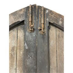 Pair of 19th century oak lancet-shaped doors, fitted with wrought iron handle and fittings
