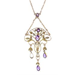 Edwardian vari-cut amethyst and seed pearl pendant, on a trace link chain, stamped 9ct 
