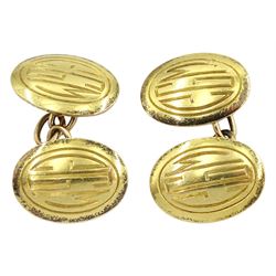 Pair of Art Deco 18ct gold oval cufflinks, engraved with initials 'CGM', stamped 18 by Goldsmiths & Silversmiths Co Ltd