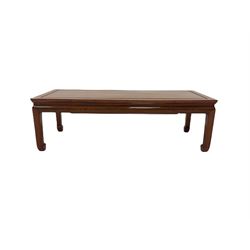 Chinese rosewood coffee table, the rectangular top raised on square supports W125cm, H39cm, D52cm 