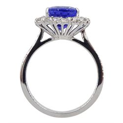 18ct white gold oval tanzanite and round brilliant cut diamond cluster ring, stamped 750, tanzanite approx 3.05 carat 