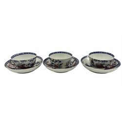 Three 18th century Liverpool porcelain tea bowls and saucers, painted in underglaze blue with the Cannonball pattern and over painted with iron, red and gold, saucer D13.5cm