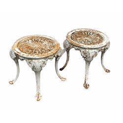 Pair of Coalbrookdale style cast iron stools/chair bases, the pierced circular tops raised on four scrolled and reeded supports with splayed feet, W45cm