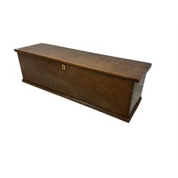 18th century oak sword chest, rectangular hinged lid, the interior with candle box, raised on plinth base