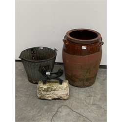  salt glazed terracotta urn, (D42cm) a galvanised metal bucket bearing plaque reading 'The four oaks, Sutton Coldfield' (D37cm) and a cast iron boot scraper,   