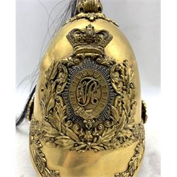 Victorian 6th Dragoon Guards or Carabineers 1847 Albert pattern helmet, brass skull decorated with gilt floral leaf design, mounted with gilt helmet plate overlaid with white metal hobnail star bearing gilt title strap with VR cypher to centre, gilt plume holder supporting the black horsehair plume and brown leather liner and tie string, H30cm