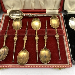 Set of six silver gilt Anointing spoons, cased Birmingham 1951 Maker Adie Bros., set of six silver coffee spoons with shaped finials and another set of six silver coffee spoons