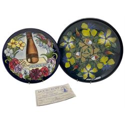 Two Moorcroft plates comprising a Limited Edition Centennial plate no. 573/750 with certificate and 'Hypericum' pattern plate both designed by Rachel Bishop, boxed, D26cm (2)